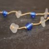 https://www.onemoregift.co.uk/product/scottish-seaglass-white- cobalt-blue -foiled- beads-knotted-waxed-cord-necklace/