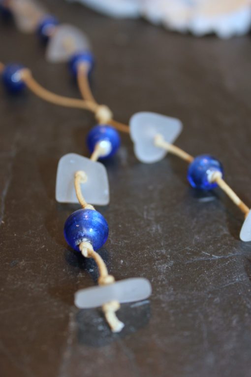 https://www.onemoregift.co.uk/product/scottish-seaglass-white- cobalt-blue -foiled- beads-knotted-waxed-cord-necklace/