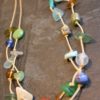 https://www.onemoregift.co.uk/product/scottish-seaglass-mixed-boho- beads-knotted-waxed-cord-necklace/