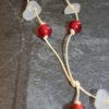 https://www.onemoregift.co.uk/product/scottish-seaglass-white- red -foiled- beads-knotted-waxed-cord-necklace/