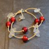 https://www.onemoregift.co.uk/product/scottish-seaglass-white- red -foiled- beads-knotted-waxed-cord-bracelet/