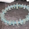 https://www.onemoregift.co.uk/product/scottish-seaglass-seafoam-aqua-marine-frosted-glass-beads-stretch-bracelet/